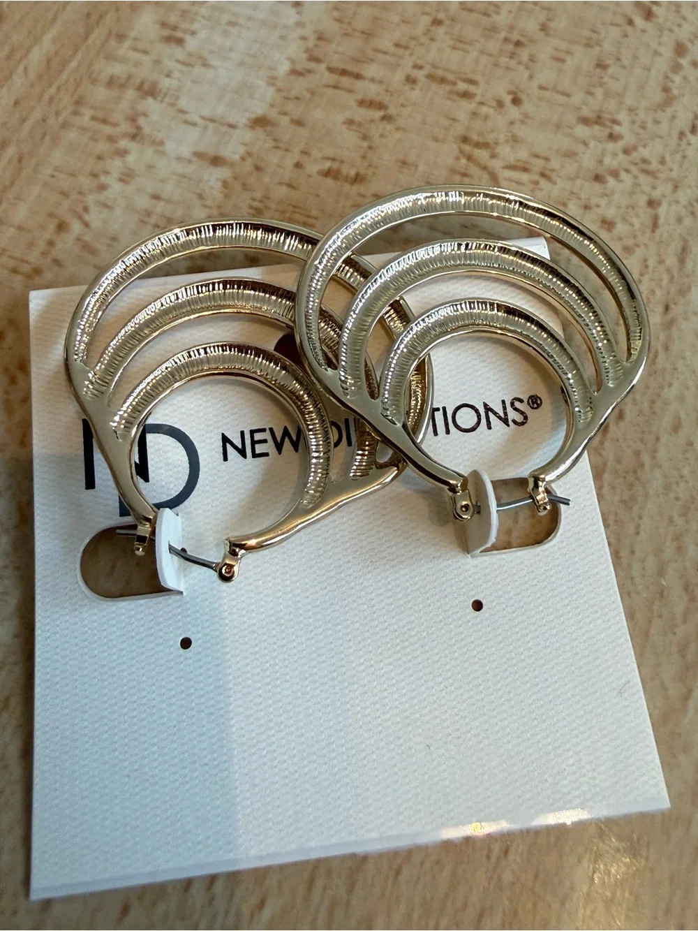 NWT. New Directions. Triple Layer Silver Hoops.